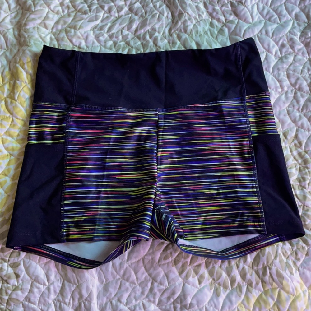 Workout shorts with leg cell phone pockets.